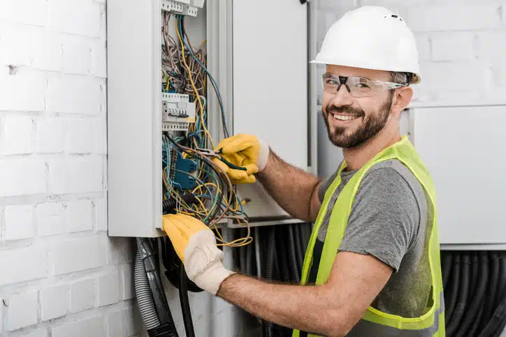 electrician repairing electrical box